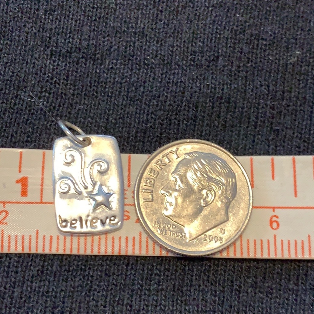 Sterling silver “believe” pendant